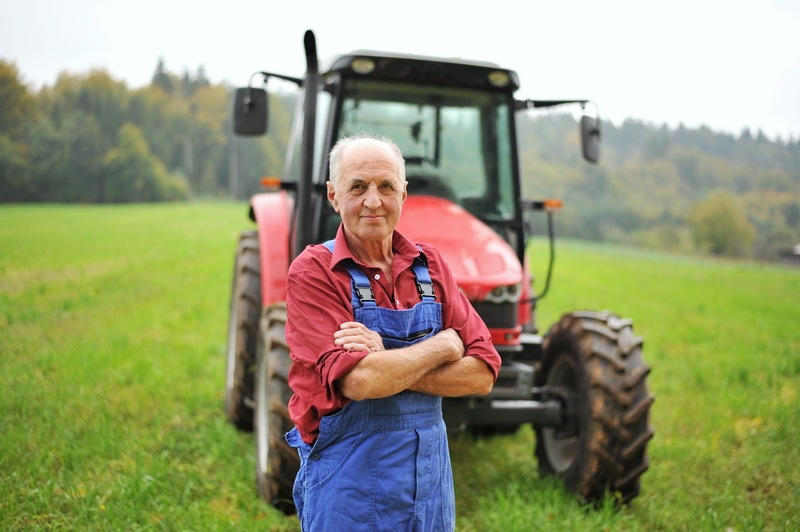 Retirement older farmer tractor